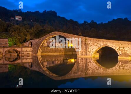 Devils Bridge at Night in Lucca, Italy Stock Photo