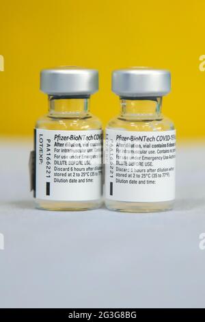 London, UK. 14th June, 2021. Vials containing Pfizer Covid-19 vaccine seen at a vaccination centre in London. Credit: SOPA Images Limited/Alamy Live News Stock Photo