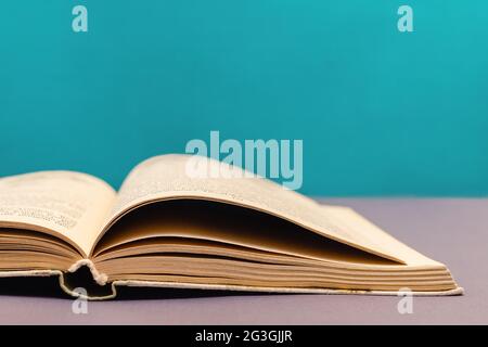 Open Book with blurred pages close up. Stock Photo