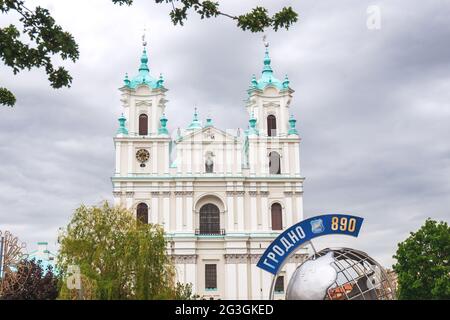 GRODNO, BELARUS - MAY 22, 2021: Cathedral of Saint Francis Xavier in Grodno, Belarus. Farny Catholic church facade and sign Grodno 890 Stock Photo