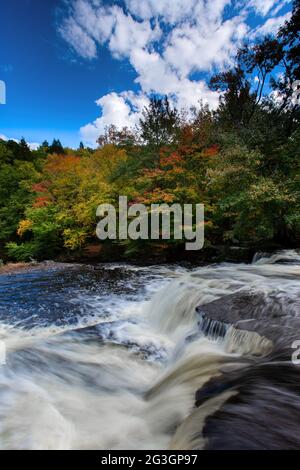 Shohola Falls along Shohola Creek in Pennsylvania's Pocono Mountains has numerous cascades before falling the final 50 feet into the main plunge pool. Stock Photo