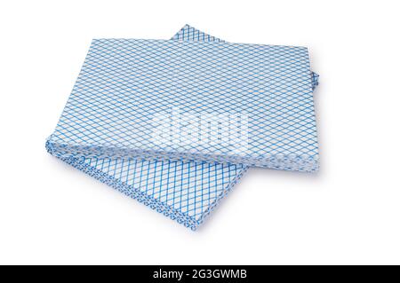 Studio shot of blue and white kitchen cleaning cloths cut out against a white background - John Gollop Stock Photo