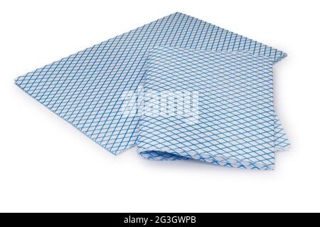 Studio shot of blue and white kitchen cleaning cloths cut out against a white background - John Gollop Stock Photo