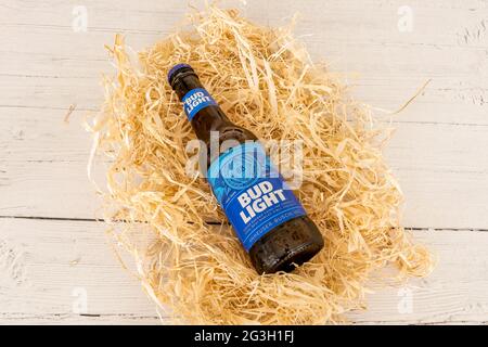 Irvine, Scotland, UK - June  15, 2021: Budweiser branded Bud Light beer in glass bottle that is recyclable across all UK local authorities. Stock Photo