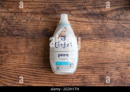 Irvine, Scotland, UK - June  15, 2021: Comfort Branded 58 wash fabric conditioner in plastic bottle and cap that is fully recyclable and in line with Stock Photo