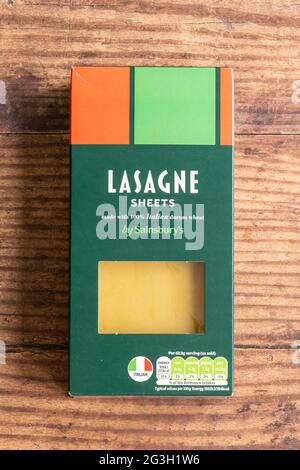 Irvine, Scotland, UK - June  15, 2021: Sainsbury’s branded box of Lasagne sheets in a cardboard package that is recyclable in line with current UK rec Stock Photo