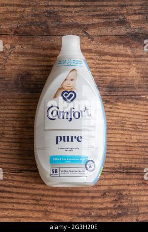 Irvine, Scotland, UK - June  15, 2021: Comfort Branded 58 wash fabric conditioner in plastic bottle and cap that is fully recyclable and in line with Stock Photo