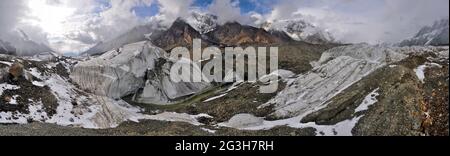 Panorama of scenic Engilchek glacier with picturesque Tian Shan mountain range in Kyrgyzstan Stock Photo