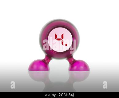 Small pink plastic object with a digital display Stock Photo