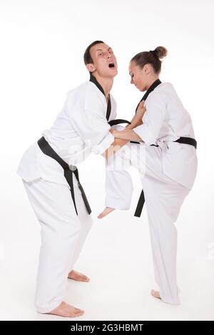 Knee strike in close fight Stock Photo