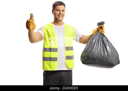 Garbageman holding a black bin bag and pointing isolated on white ...