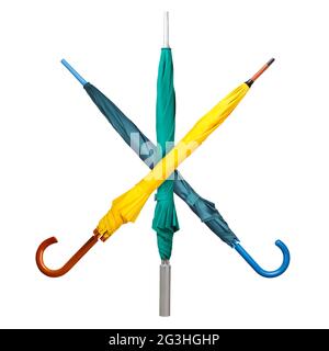 Crossed umbrellas on white Stock Photo