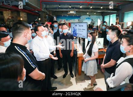 Changchun, China's Jilin Province. 16th June, 2021. Chinese Premier Li Keqiang, also a member of the Standing Committee of the Political Bureau of the Communist Party of China Central Committee, visits Ferry Innovation Works in Changchun City, northeast China's Jilin Province, June 16, 2021. Li made an inspection tour to the cities of Songyuan and Changchun in northeast China's Jilin Province from Tuesday to Wednesday. Credit: Pang Xinglei/Xinhua/Alamy Live News Stock Photo