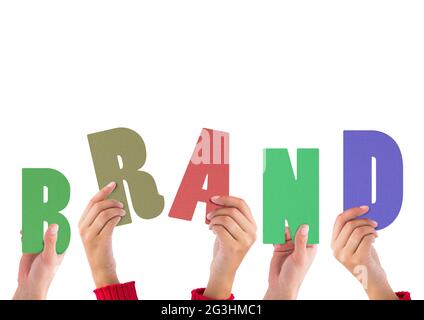 Composition of hands holding colourful letters, spelling out the word brand, on white Stock Photo