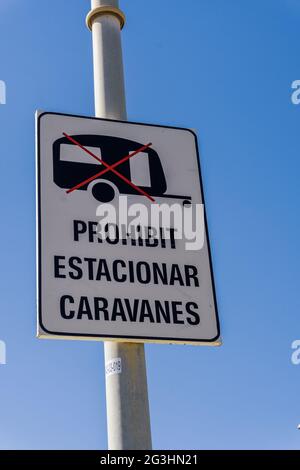 Road sign forbidden to park caravans TRANSLATION: Forbidden to park caravans Stock Photo