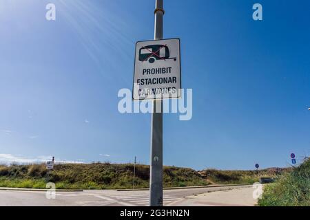 Road sign forbidden to park caravans TRANSLATION: Forbidden to park caravans Stock Photo