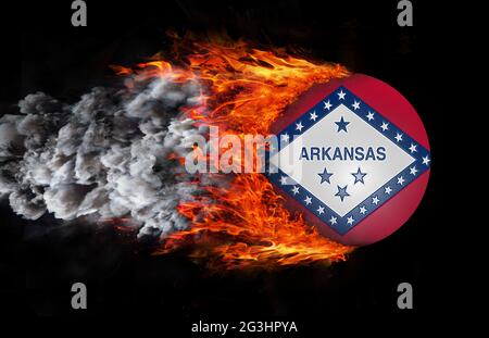 Flag with a trail of fire and smoke - Arkansas Stock Photo