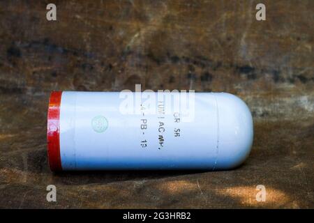 Tear-gas canister used by french riot police, France Stock Photo