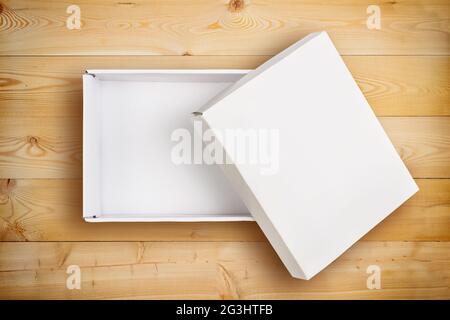 Opened empty cardboard box with cover Stock Photo