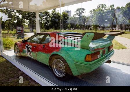 Warsaw, Poland. 16th June, 2021. The BMW M1 painted by Andy Warhol seen during the exhibition.Four cars from the famous BMW Art Car collection are exhibited at the Vistula Boulevards (Bulwary Wislane). The authors of these unique works of art are Roy Lichtenstein, Andy Warhol, A. R. Penck and Sandro Chia. Credit: SOPA Images Limited/Alamy Live News Stock Photo