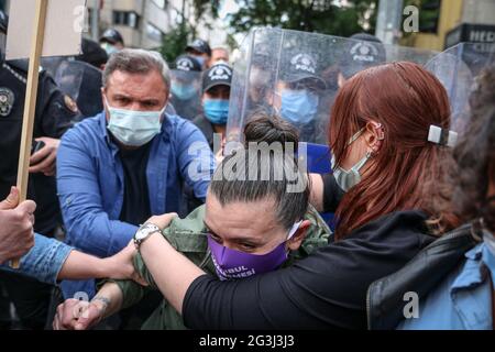 Ankara, Turkey. 16th June, 2021. Police arrests a protester during the demonstration.Turkey withdrew from the Istanbul Convention on March 20, 2021 by the decision of President Recep Tayyip Erdo?an. Women's organizations in Ankara organized an action to protest the withdrawal from the convention. The police intervened due to COVID-19 restrictions. Credit: SOPA Images Limited/Alamy Live News Stock Photo