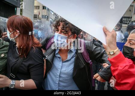 Ankara, Turkey. 16th June, 2021. Police arrests a protester during the demonstration.Turkey withdrew from the Istanbul Convention on March 20, 2021 by the decision of President Recep Tayyip Erdo?an. Women's organizations in Ankara organized an action to protest the withdrawal from the convention. The police intervened due to COVID-19 restrictions. (Photo by Tunahan Turhan/SOPA Images/Sipa USA) Credit: Sipa USA/Alamy Live News Stock Photo