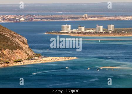 Beautiful landscape of the mouth of the Sado river in Portugal, with Figueirinha beach in the foreground and the tourist resort of Troia in background. Stock Photo