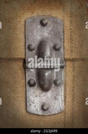 Old canvas trunk hinge close up Stock Photo