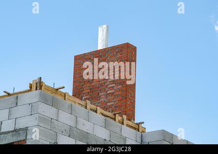 Building site of a house under construction made from white foam blocks. Building new frame of home. Stock Photo