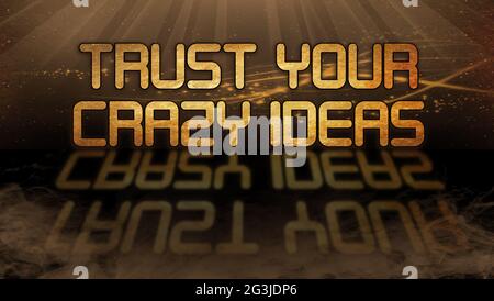 Gold quote - Trust your crazy ideas Stock Photo