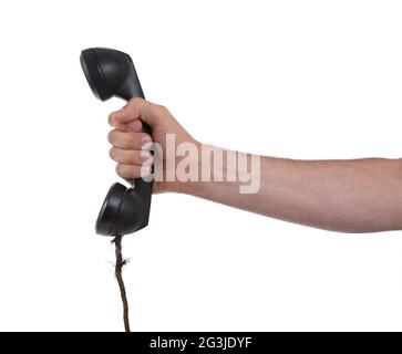 Male hand holding retro landline telephone Stock Photo