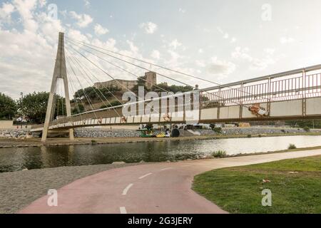 Fuengirola Spain, Pedestrian Bridge, Puente de la Armada Española crossing Rio Fuengirola river, Andalusia, Spain. Stock Photo