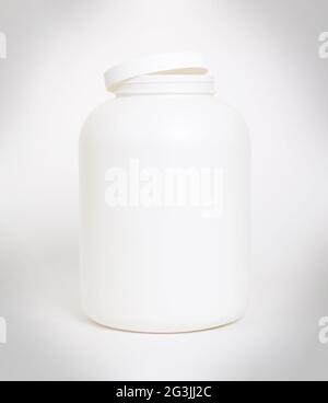 Empty protein powder container Stock Photo