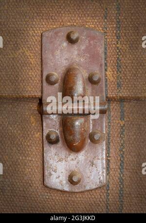 Old canvas trunk hinge close up Stock Photo