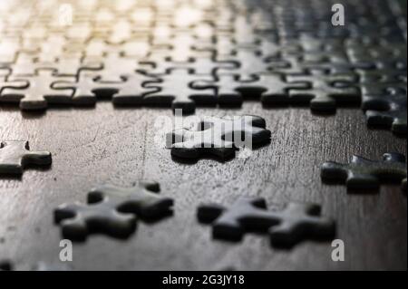 Partially Completed Puzzle in Sun Stock Photo