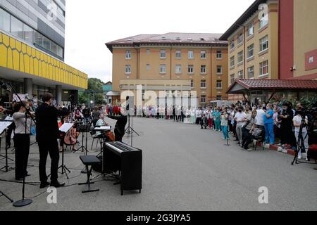 Bucharest, Romania. 16th June, 2021. Members of a classical musical band perform for medical workers in Bucharest, Romania, on June 16, 2021. The band performed to thank medical workers fighting the COVID-19 pandemic in Bucharest on Wednesday. Credit: Cristian Cristel/Xinhua/Alamy Live News Stock Photo