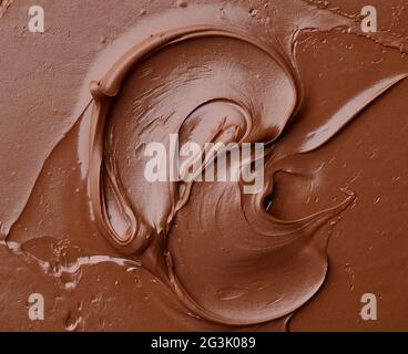 melted chocolate cream  background, top view Stock Photo