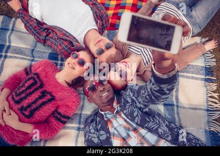 Best friends making selfies on picnic Stock Photo - Alamy