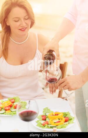 Sommelier demonstrating red wine Stock Photo