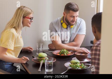 Business people in vegan restaurant Stock Photo