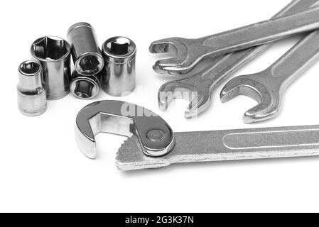 various types of wrenches: open, socket and self-adjusting on white background Stock Photo