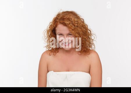 Spiting mature woman Stock Photo