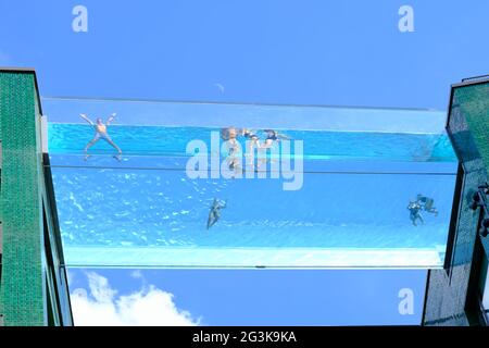 London Uk A View Of Embassy Gardens Legacy Buildings And Suspended Transparent Acrylic Resident S Sky Pool As Seen From Nine Elms Lane Stock Photo Alamy