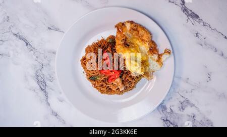 Stir fried vermicelli or Bihun goreng, Malaysian style spicy stir fried ...