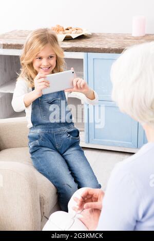 Grandmother posing for camera Stock Photo