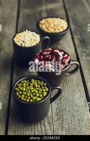 Green mung beans, red beans, couscous and wheat grains Stock Photo