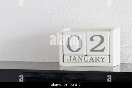 White block calendar present date 3 and month January Stock Photo