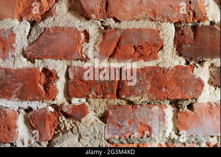 Red brick grungy background flat close up view Stock Photo