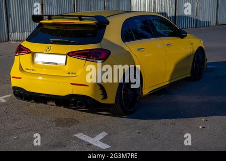 Mercedes-AMG A 35 in city parking at night Stock Photo
