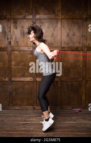 Girl jumping on skipping rope Stock Photo